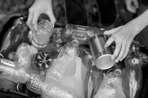 Crew sorting items for recycling during a house clearance in Croydon